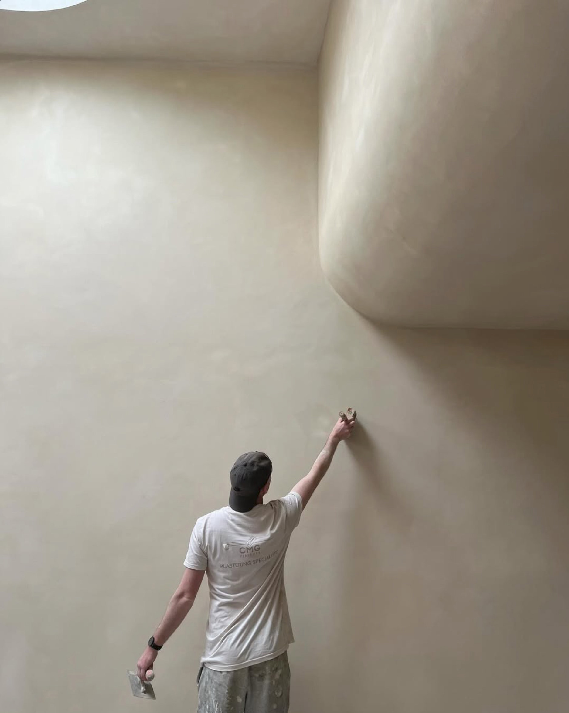 Conor McGouran at work on a lime wall